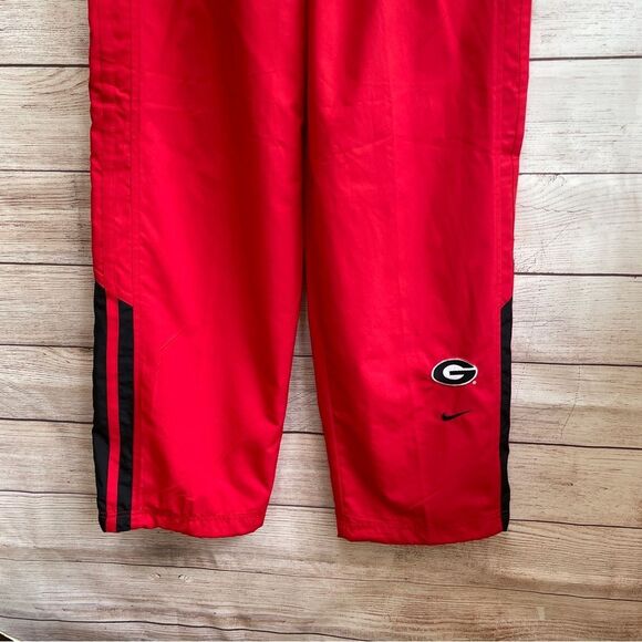 VINTAGE NIKE UNIVERSITY OF‎ GA TRACK PANTS IN RED - Picture 3 of 7